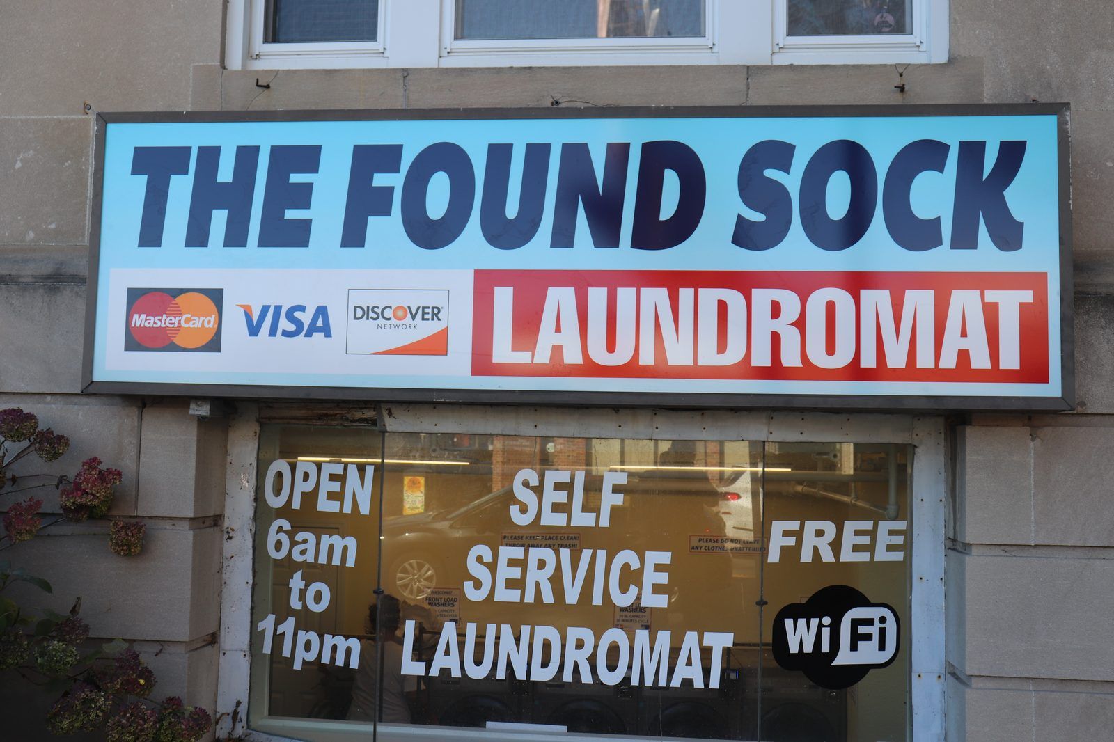 Front sign — big, brand new